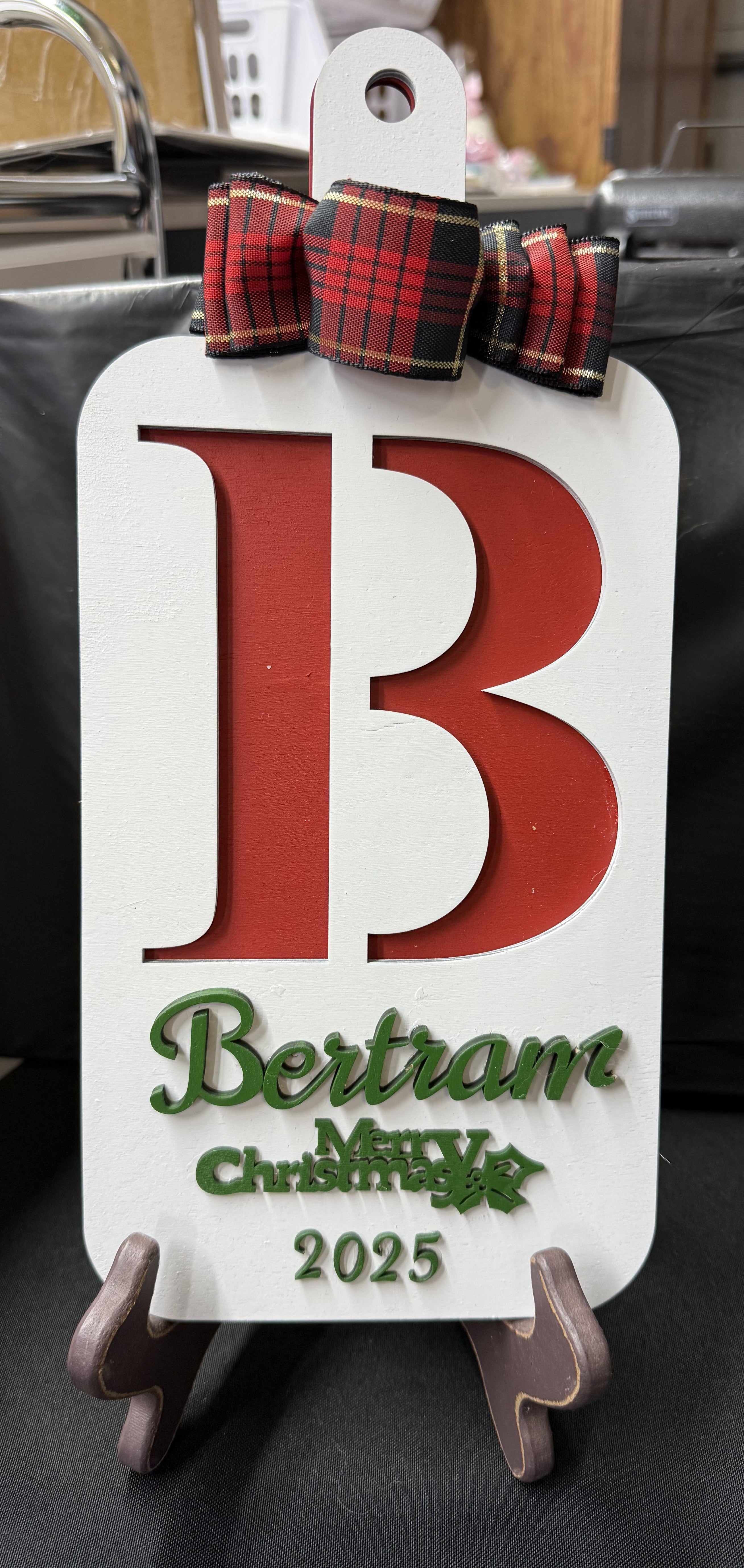 Custom Laser Cut Family Emblem Cutting Board
