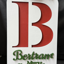 Custom Laser Cut Family Emblem Cutting Board