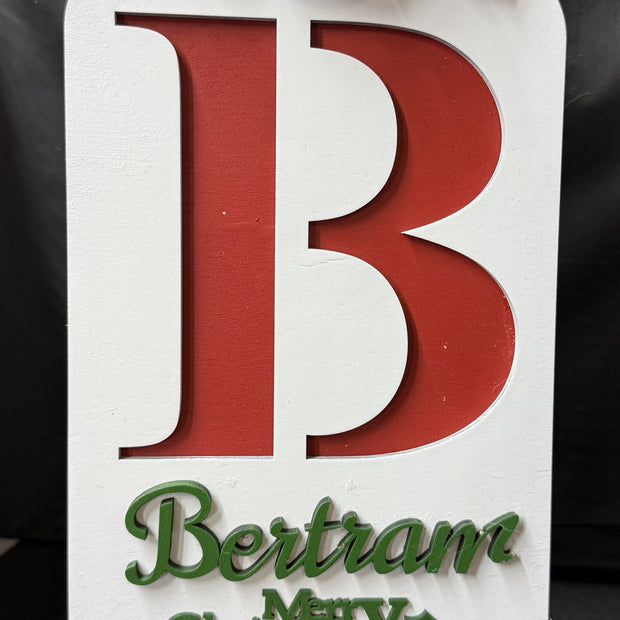 Custom Laser Cut Family Emblem Cutting Board
